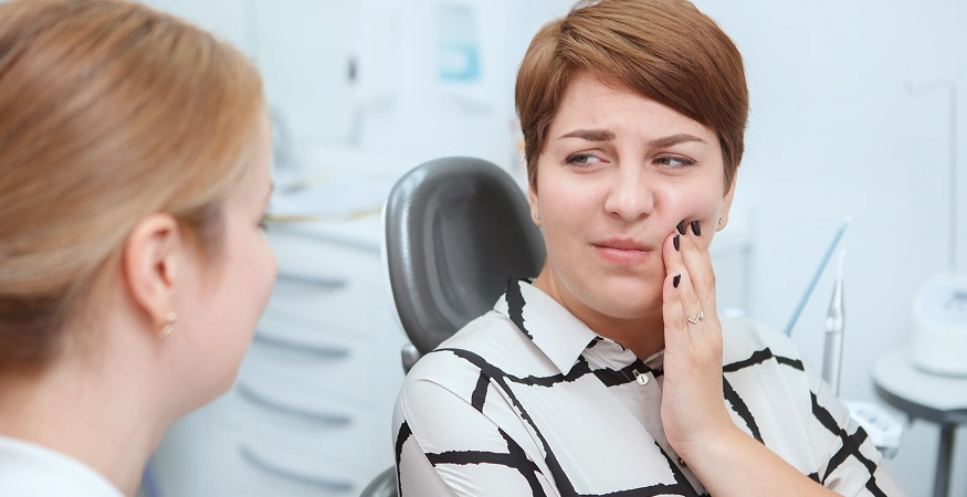 What causes jaw pain after wisdom tooth extraction